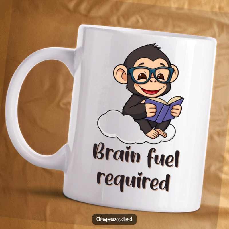 Funny mug showing a happy chimpanzee in glasses, engrossed in reading a book while sitting on a cloud.
