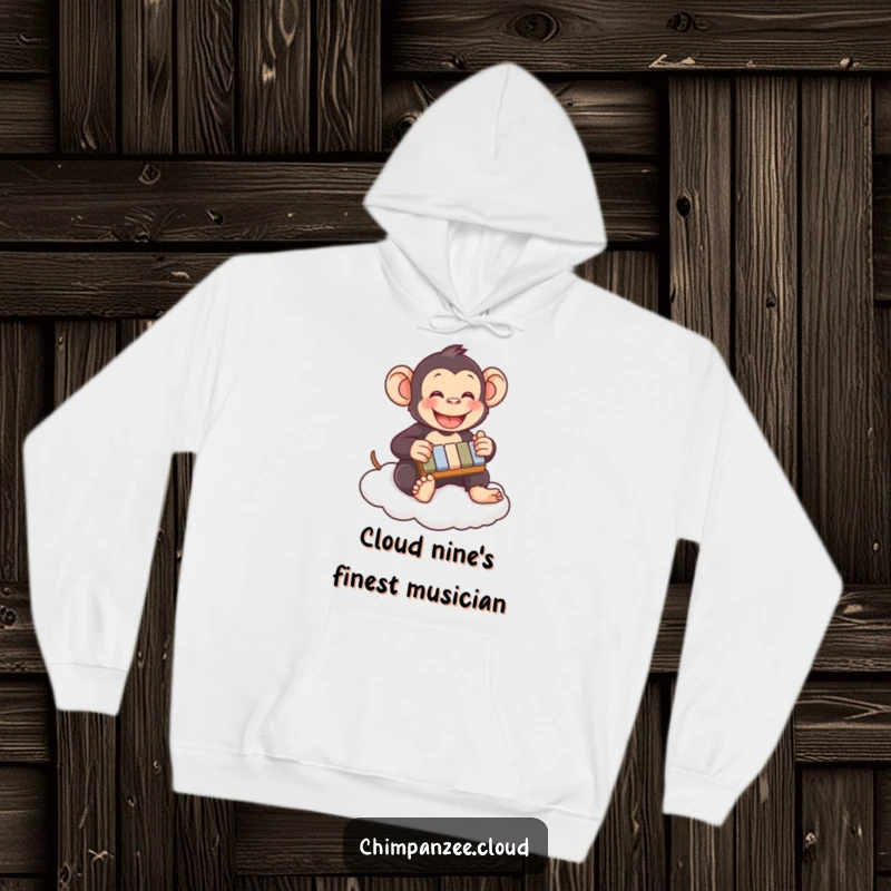 Funny chimpanzee hoodie playing a tiny xylophone on a cloud, depicting joyful musical expression, creating a cozy and humorous gift.