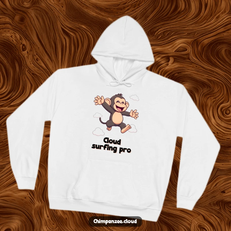 Funny bouncing chimp hoodie featuring a joyful chimpanzee leaping between clouds, great funny gift for warmth.