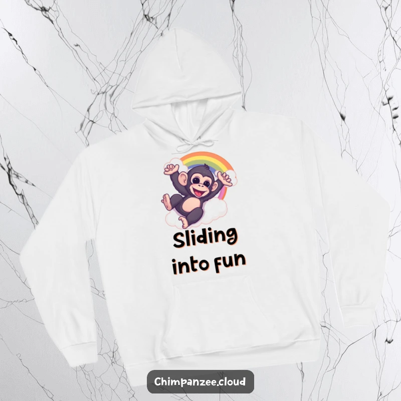 Funny chimp sliding down a vibrant cloud rainbow, depicted on a comfortable hoodie, perfect for cozying up.
